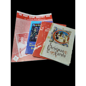 Bundle of music books and sheet music